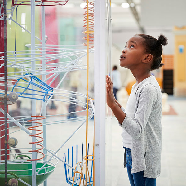 child exploring museum